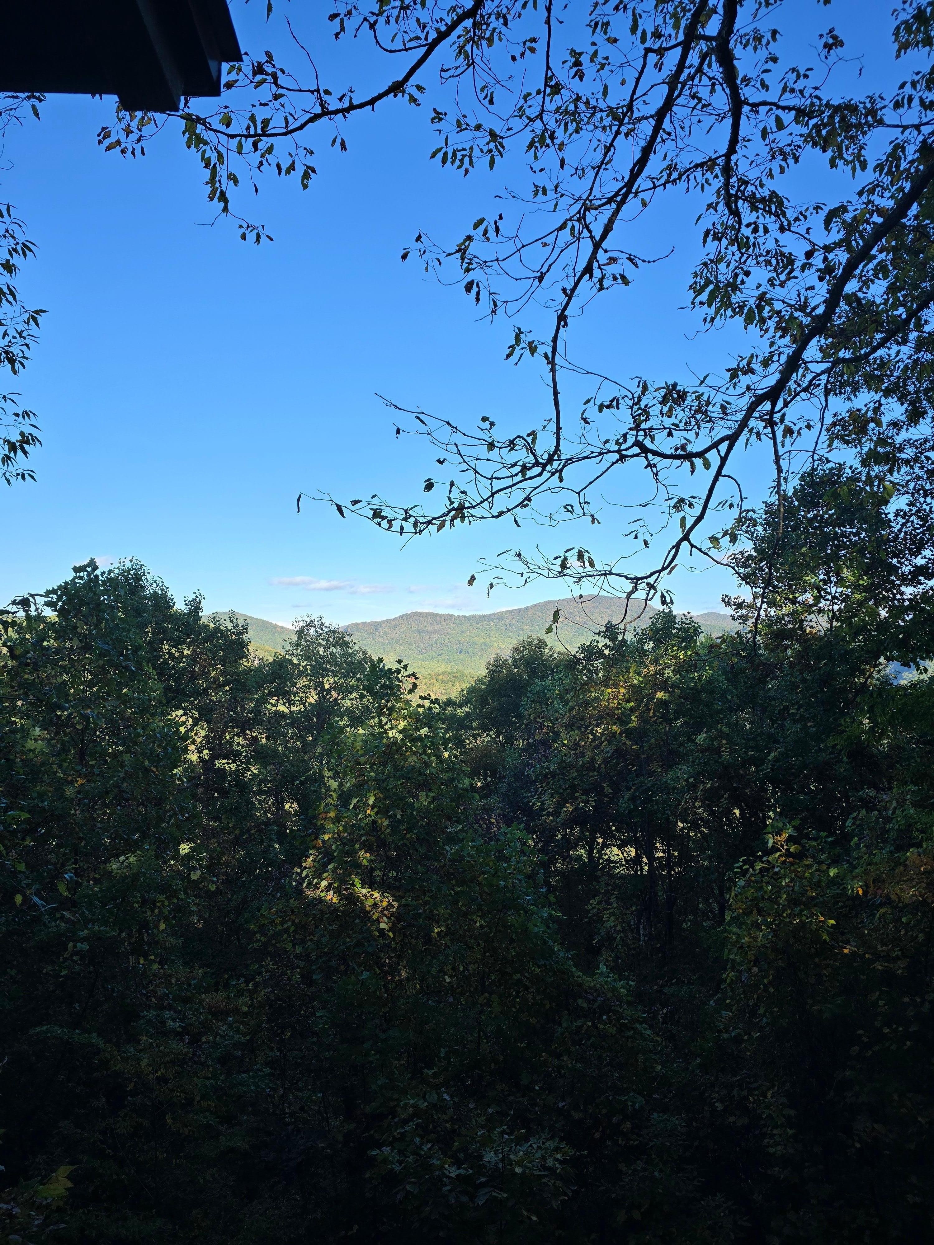 Standing near hot tub.