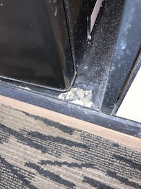 Refrigerator had dirty scum under corners