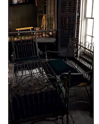 The ripped pillows with holes and exposed foam for the rusted beat up furniture. As well as the glass table, minus the glass of course.