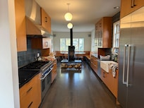 Chefs kitchen with wood burning stove