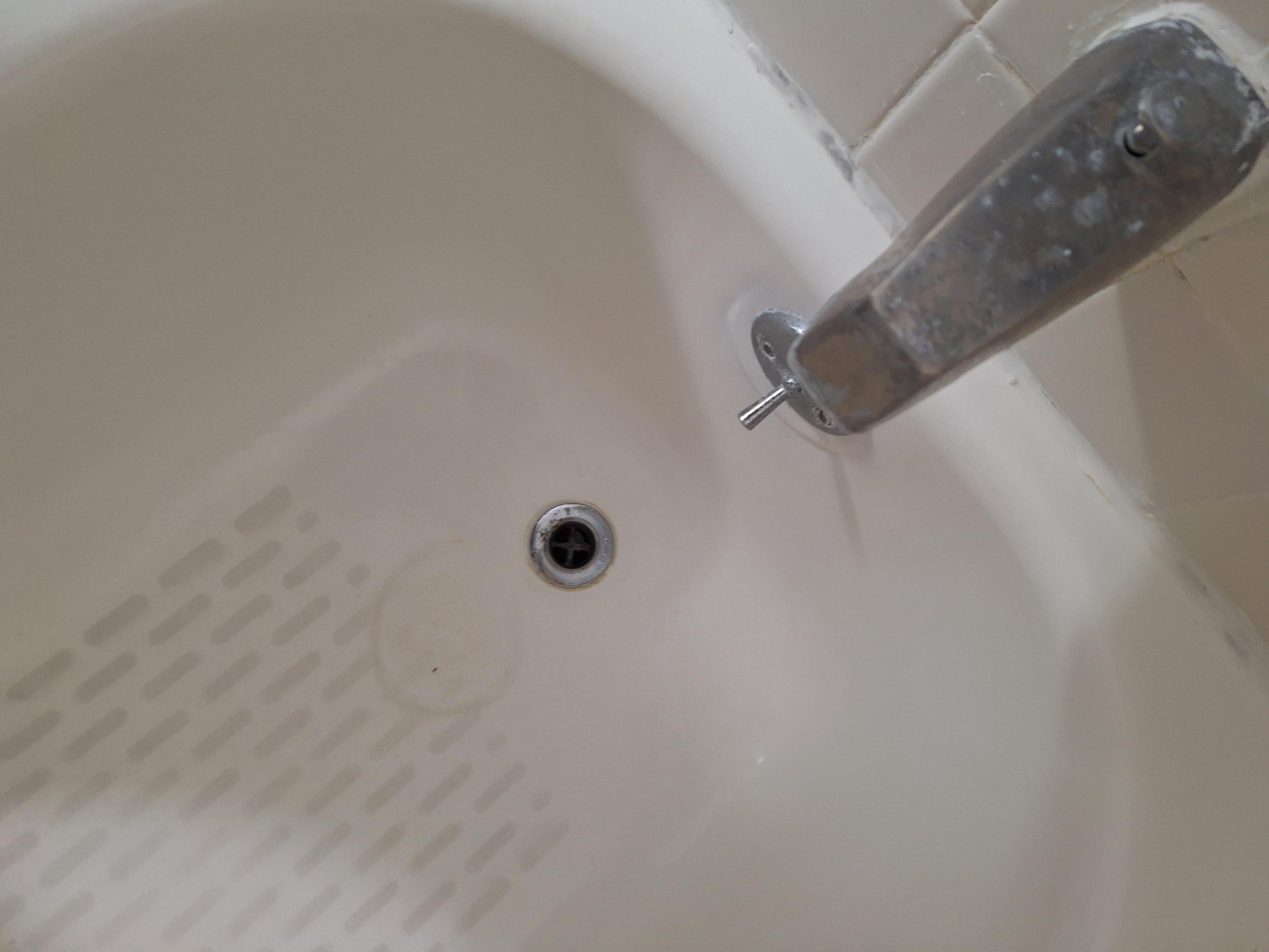 No drain plug in this clean bathroom.  This area was disgusting