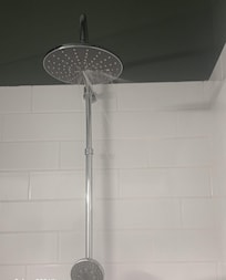 Shower head plugged and water everywhere.