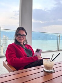 Enjoying coconut coffee and the wonderful view at the 25th floor of Awaken