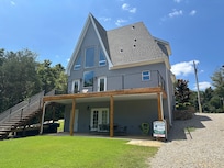 From the water, looking at the back of the house.