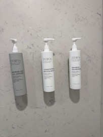 The bathroom has shampoo, conditioner and soap