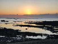 The beach is rocky but beautiful at sunrise.