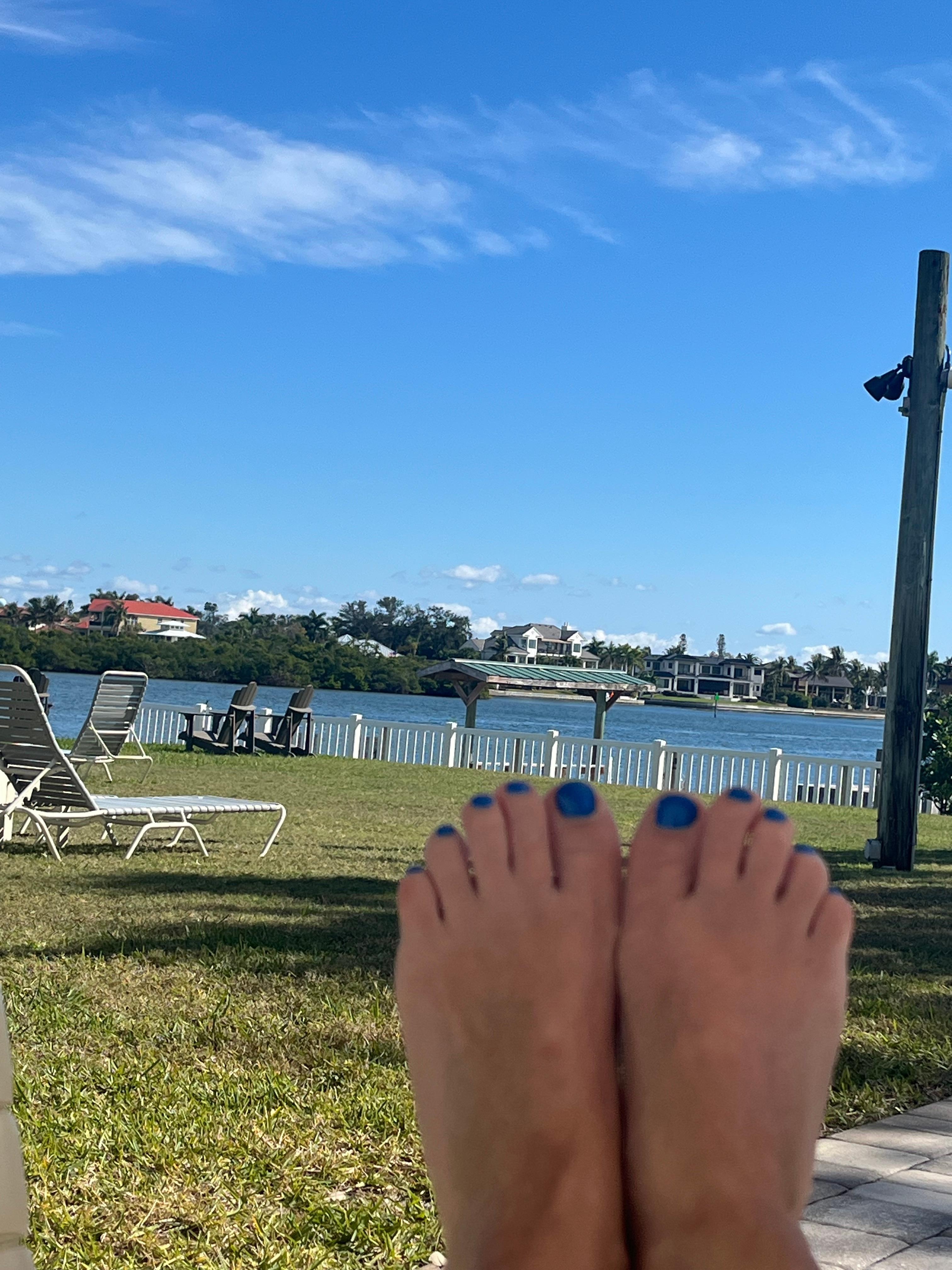 Sitting poolside watching the boats go by.  