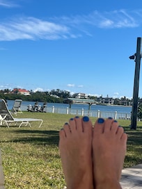 Sitting poolside watching the boats go by.