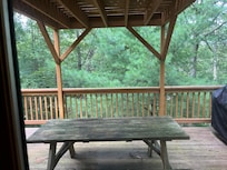 Picnic table on second floor deck.