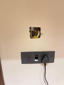 No AC or Wifi in room. Incomplete electrical work in room. Exposed wires posing electrocution risk
