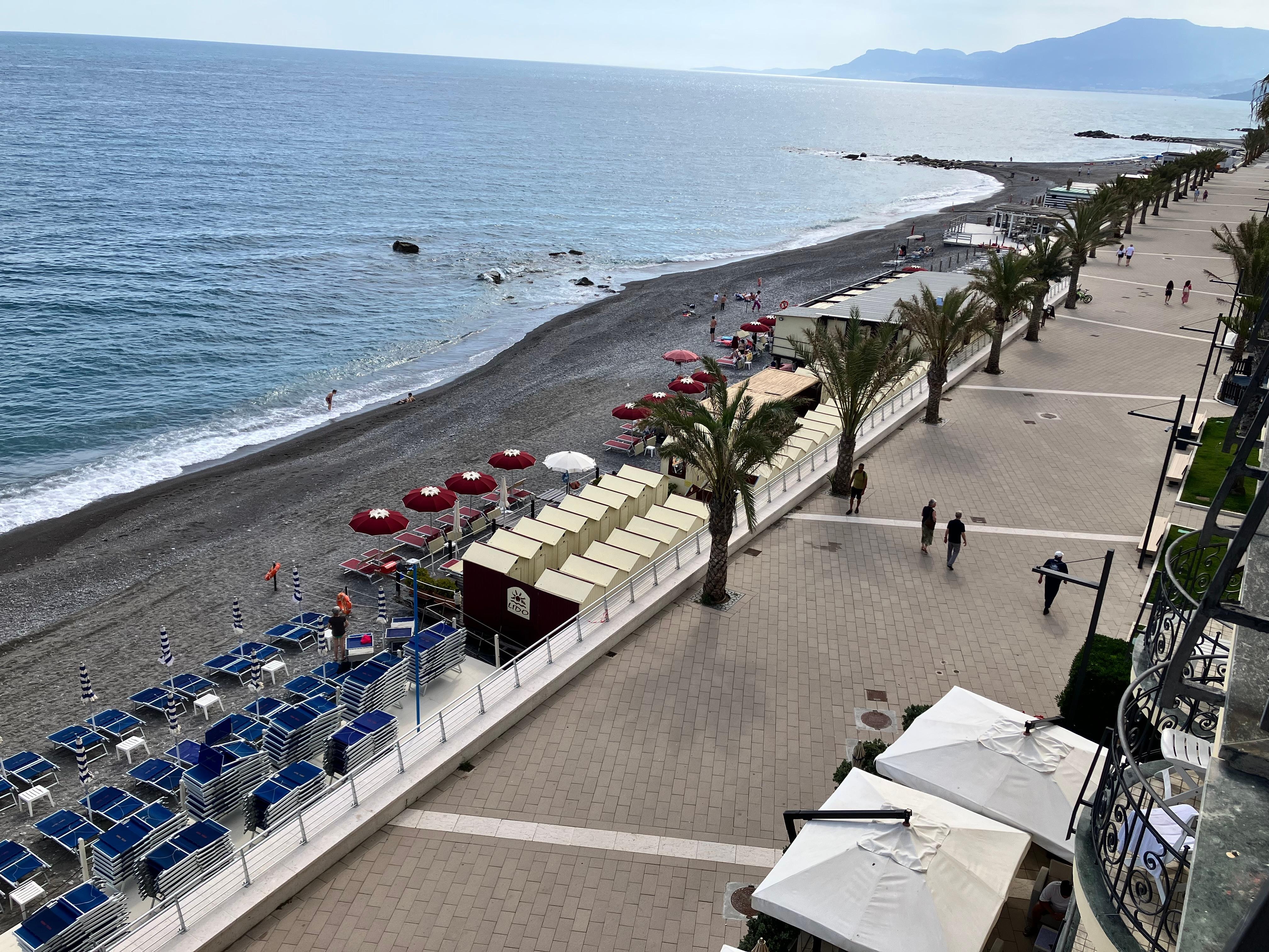 The promenade and private beach from our balcony