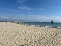 The beach at the beach club with free shuttle