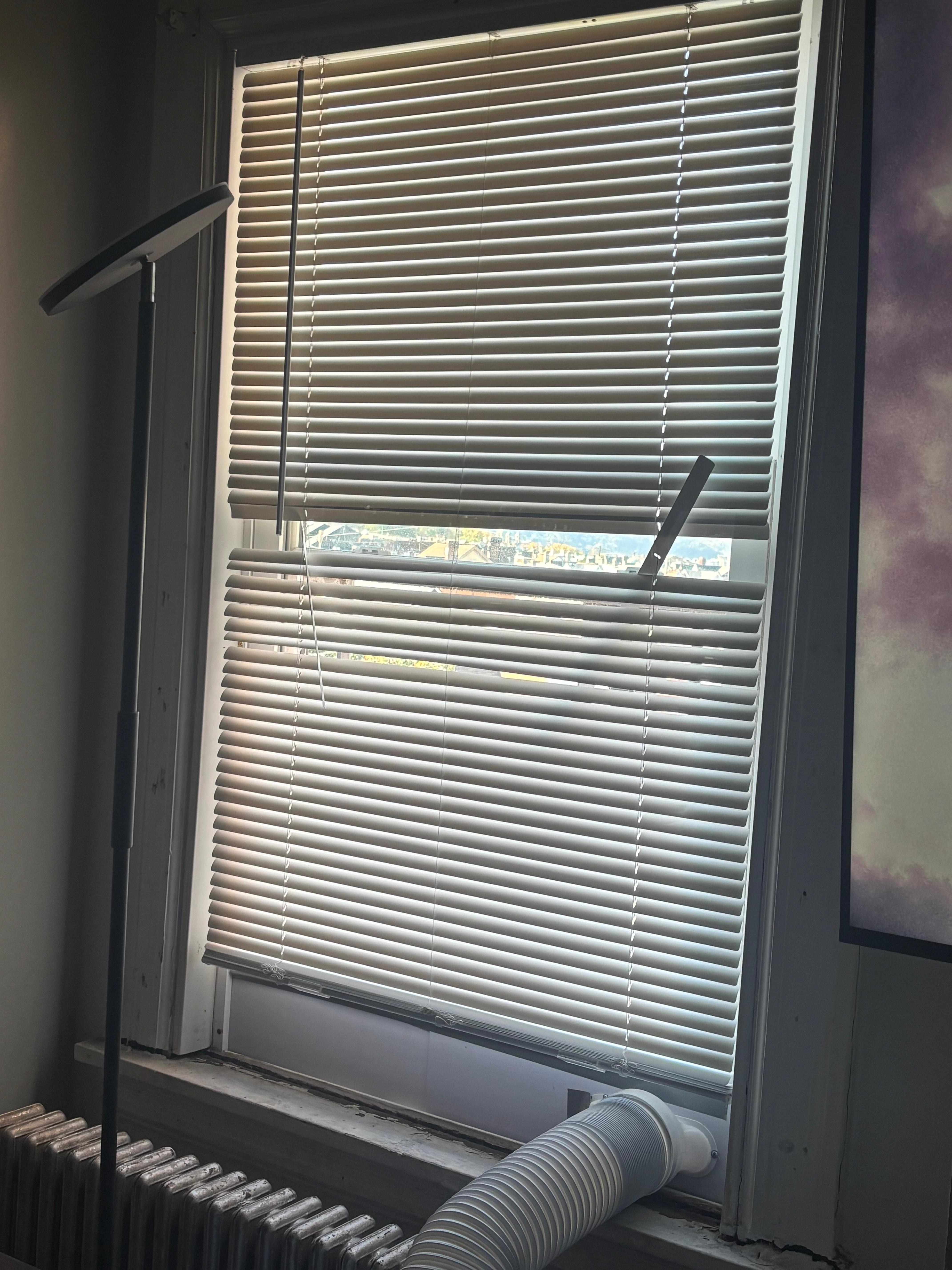 Living room broken blind 