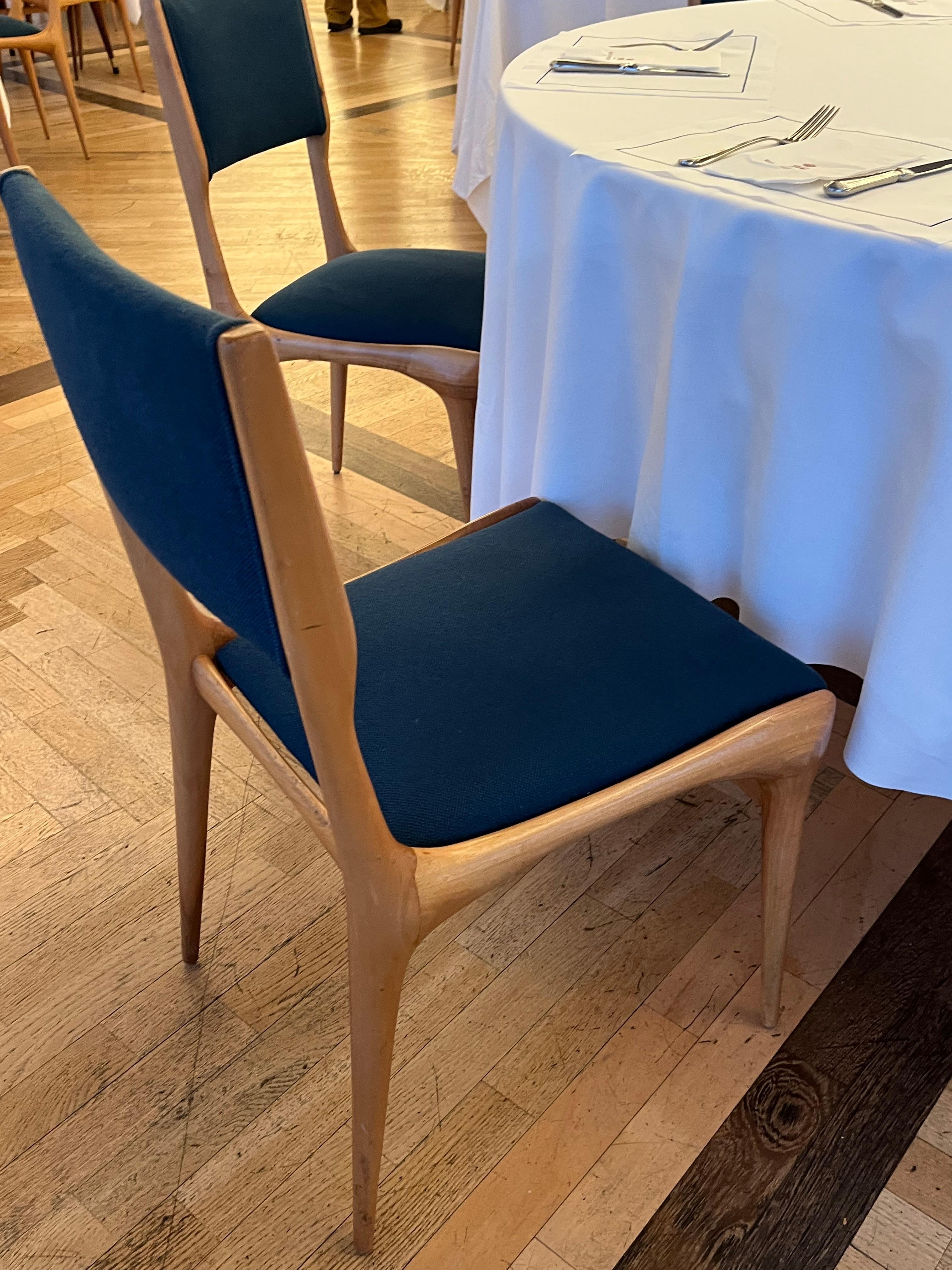 Original chairs designed by Carlo de Carli