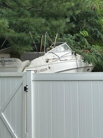 Boat in driveway as example of neglect