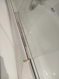 Mould and rust on shower screen (which didnt function)