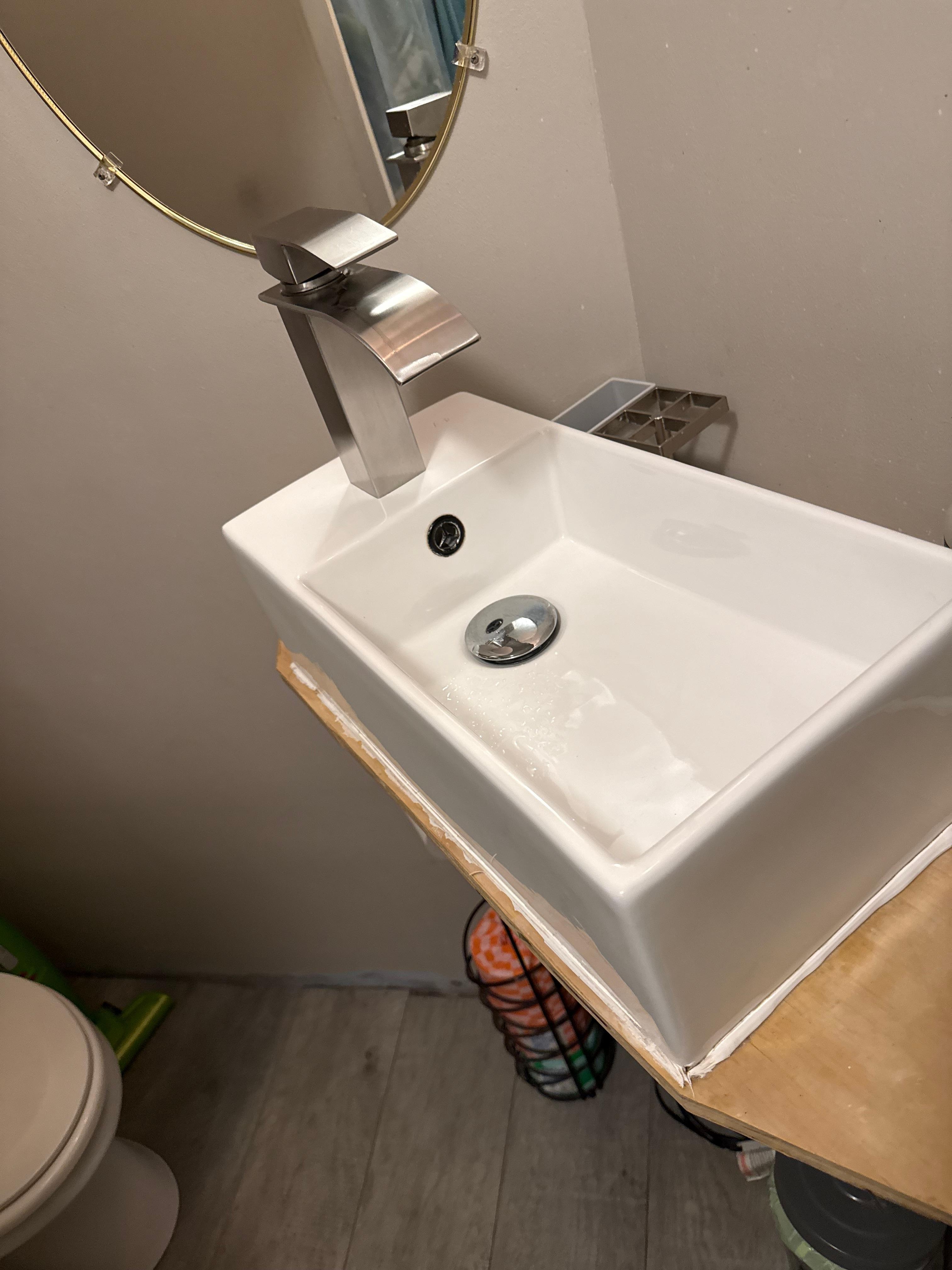 This tiny sink from IKEA has been flowing me around for years!! 