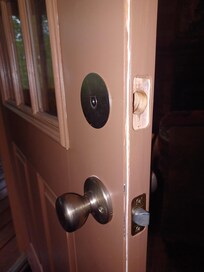 Door leading from living area to hot tub. No way to lock