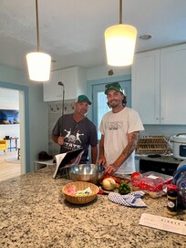 The guys preparing a meal in this beautiful kitchen! They have everything you need!!!