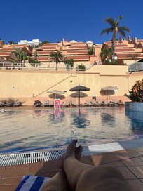 Swimming pool view, with adult, infant and young areas.