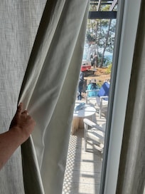 Workers outside lounging on our patio. One even asked as for a beer.