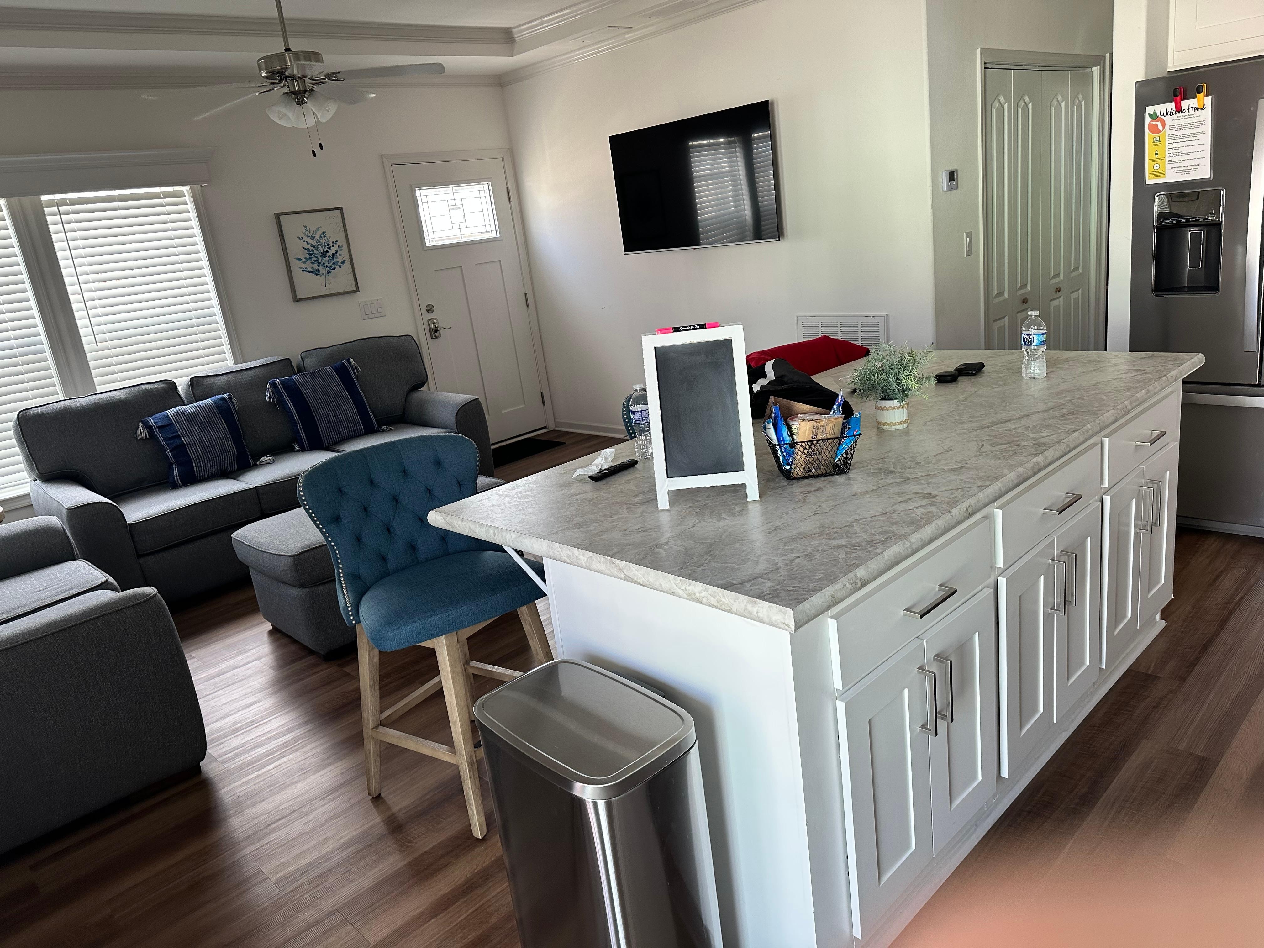 Open kitchen and living area was perfect for our stay!