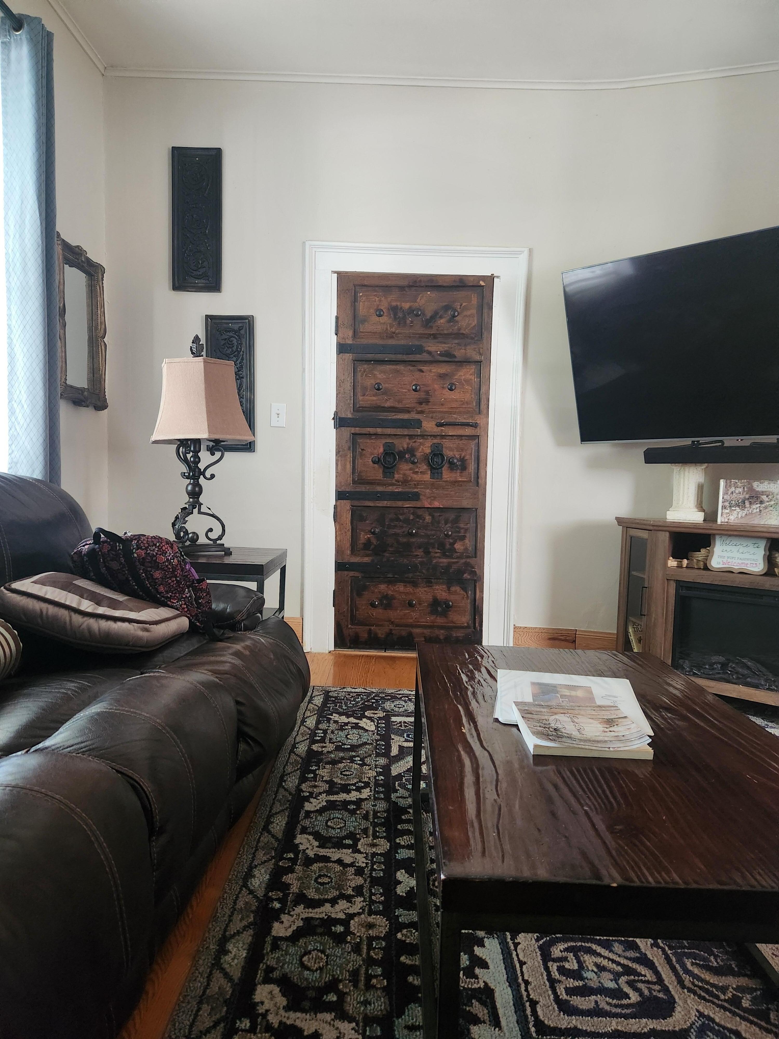 Comfortable couches with leg rests. Huge TV with soundbar.