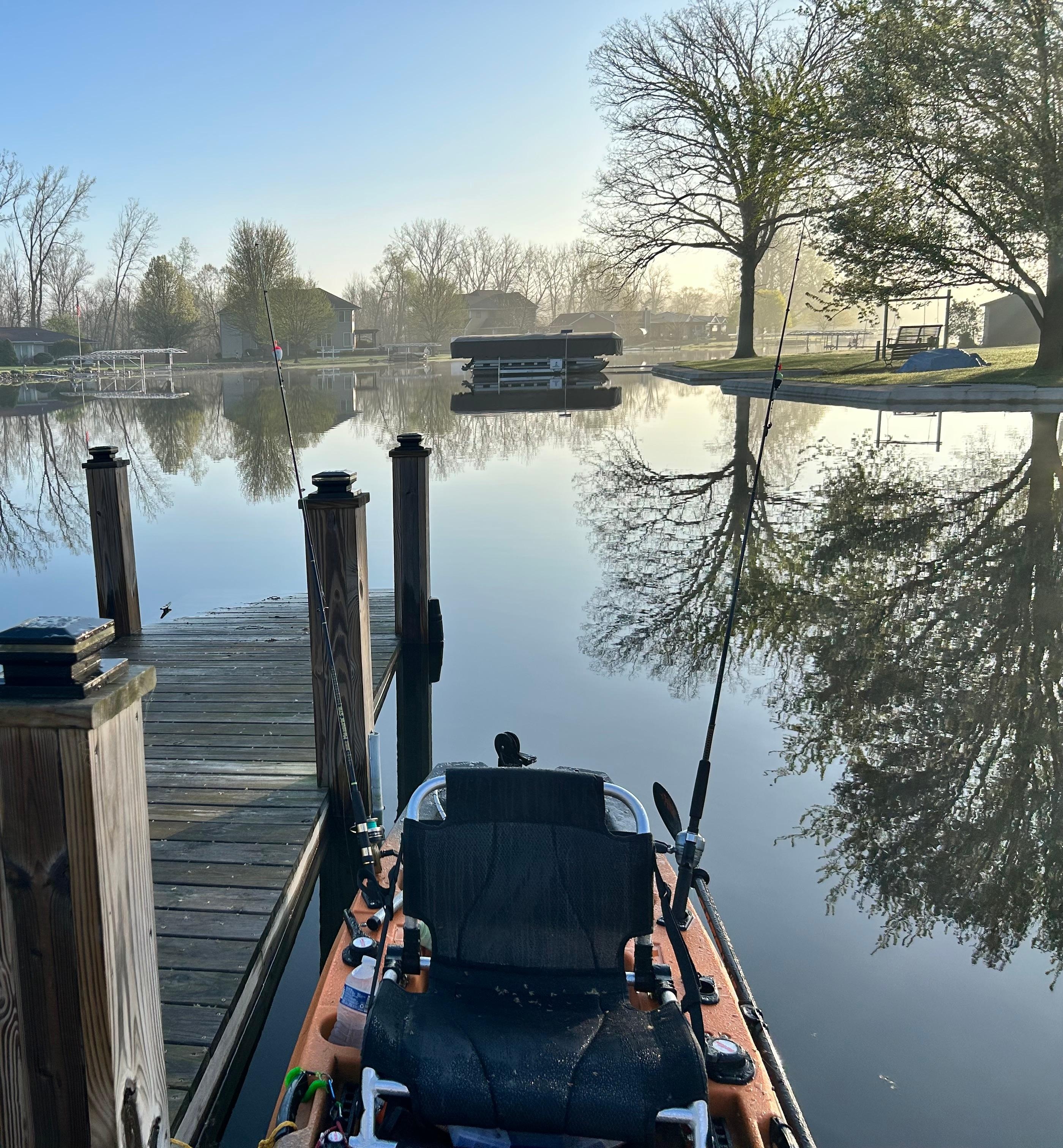 My kayak tied to the boat dock in the rear of the house.