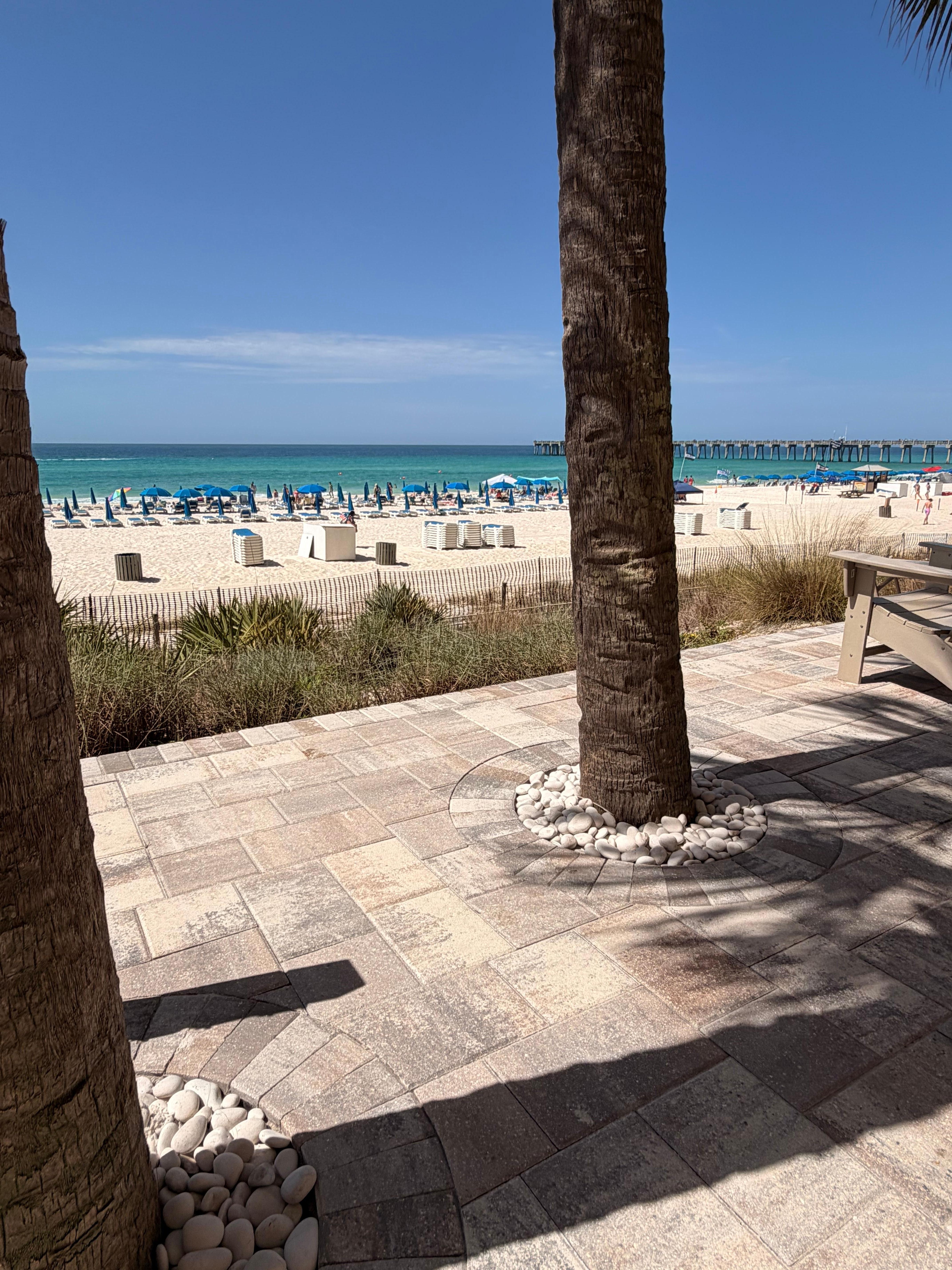 View of the beach from the resort pool. 