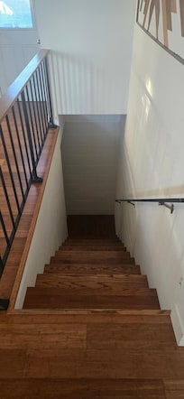 Steps down to 3rd bathroom. 3 more stairs to the left after the landing.