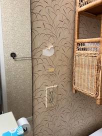 Holes in wallpaper