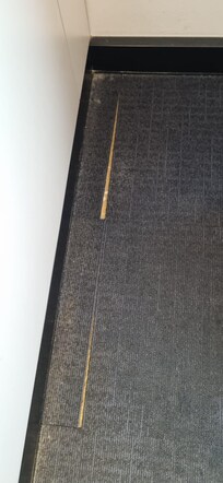 Threadbare, dirty carpet, no idea when last vacuumed, was filthy