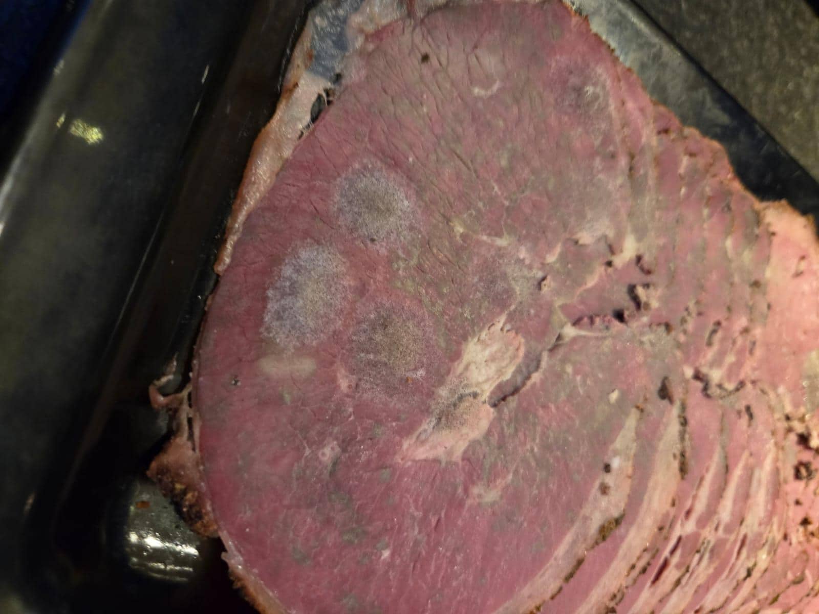 Meat counter. Mouldy closeup