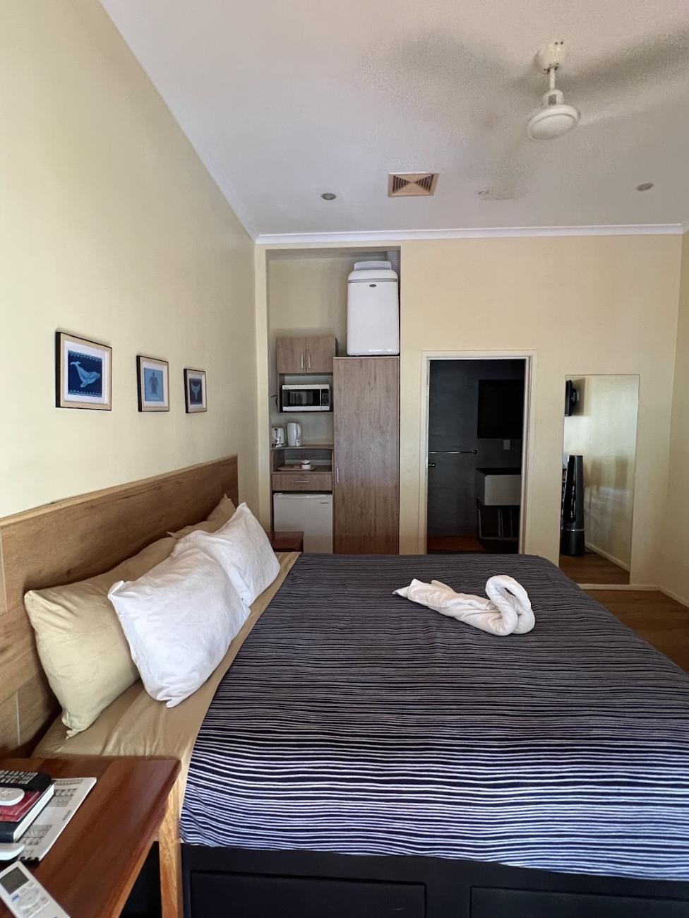 Clean and tiny bedroom.