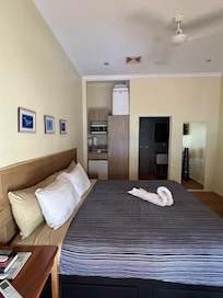 Clean and tiny bedroom.