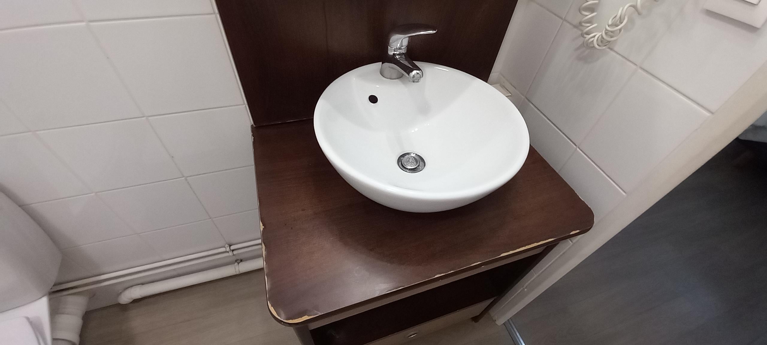 Old and scuffed vanity unit