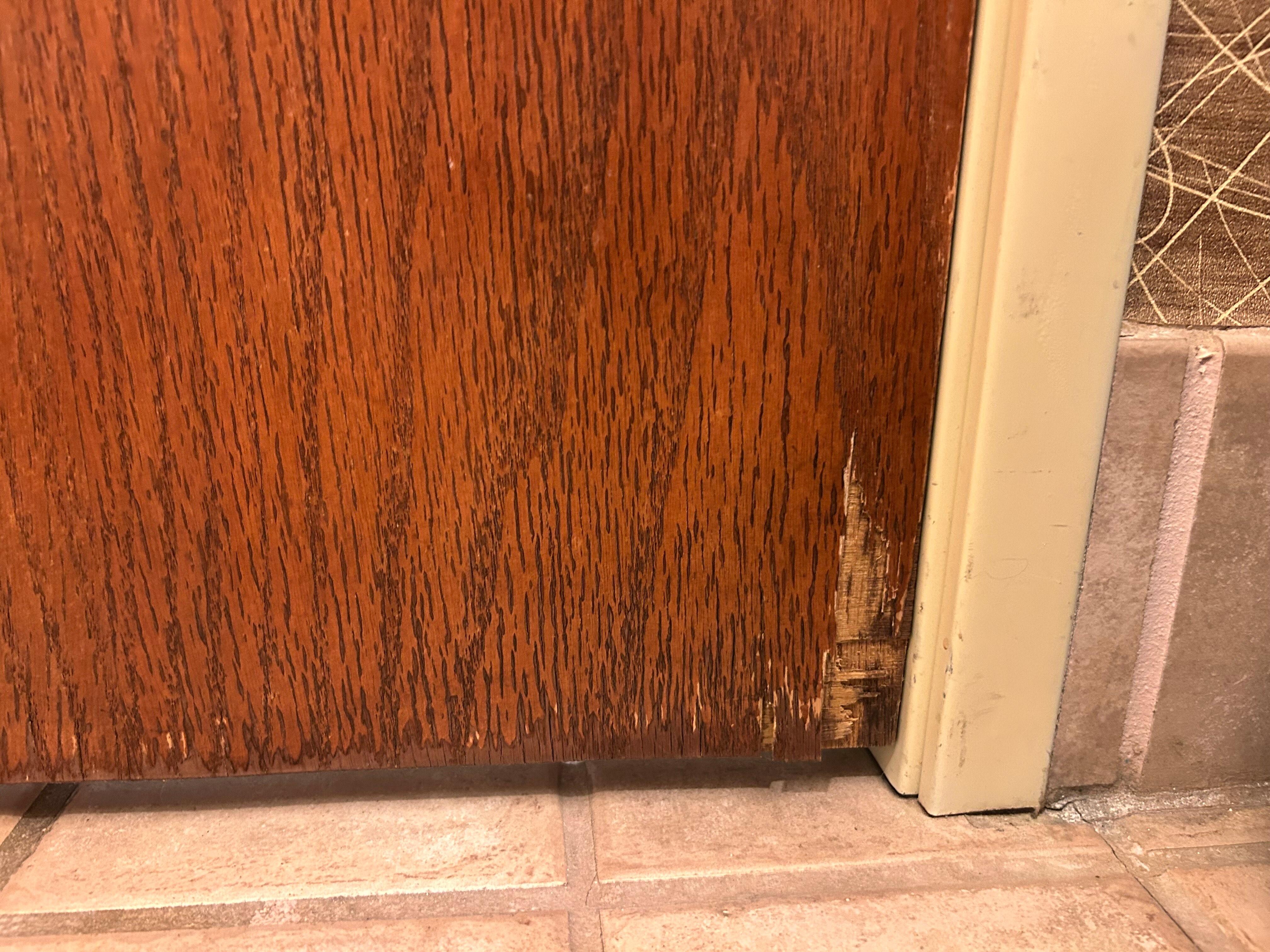 Broken wood trim on most doors