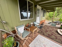 Cabin porch was charming and cozy like the inside. The pictures on VRBO don't do the cabin justice.