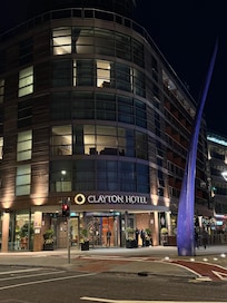 The hotel entrance at night.