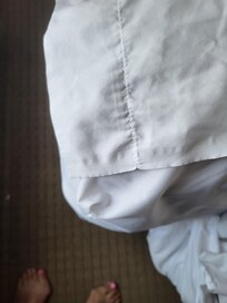 This was end of the bed. The sheet could not even be tucked in it was just laid there.