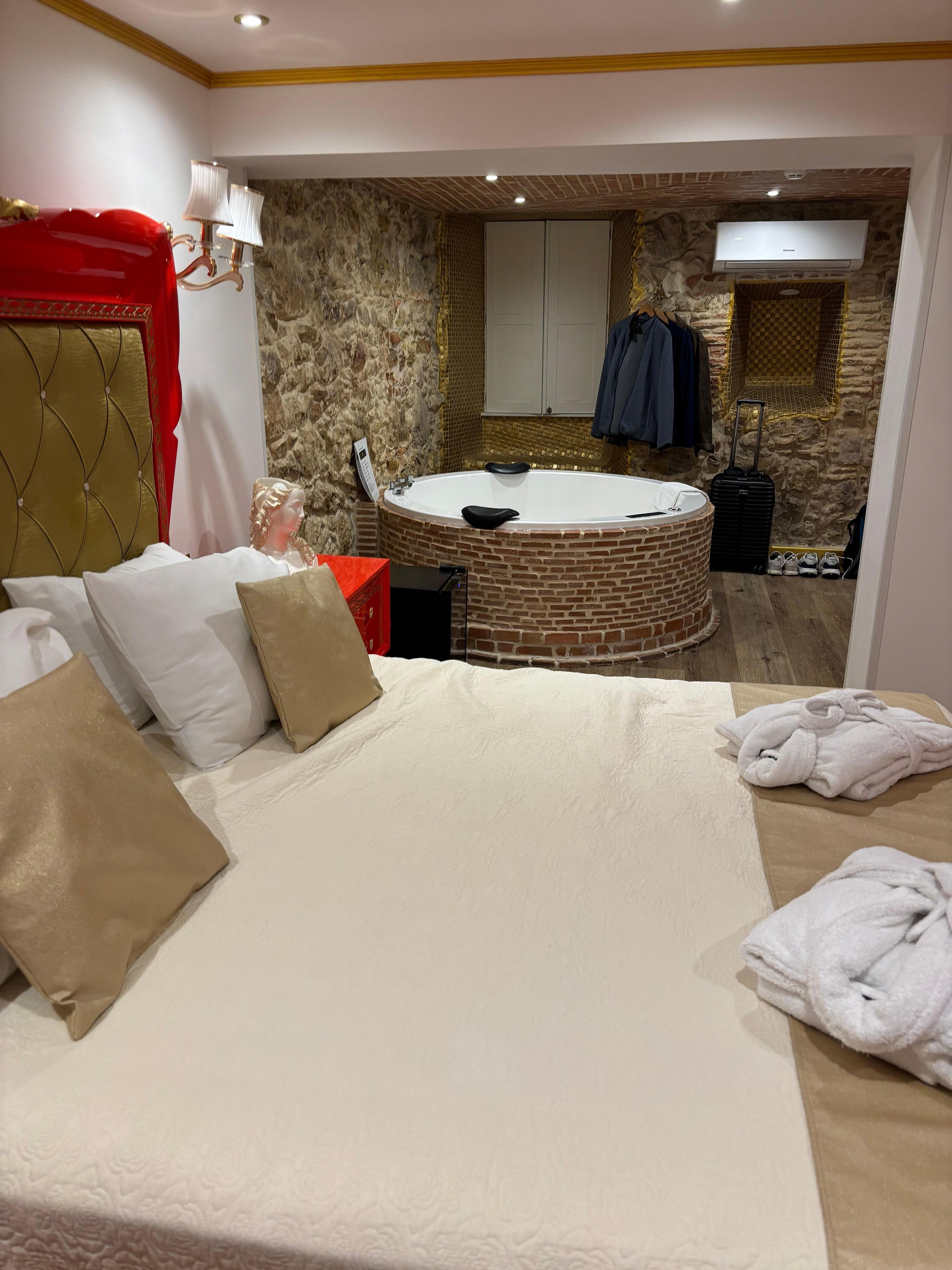 Jacuzzis in middle of room. 