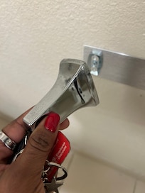 Broken toilet paper holder