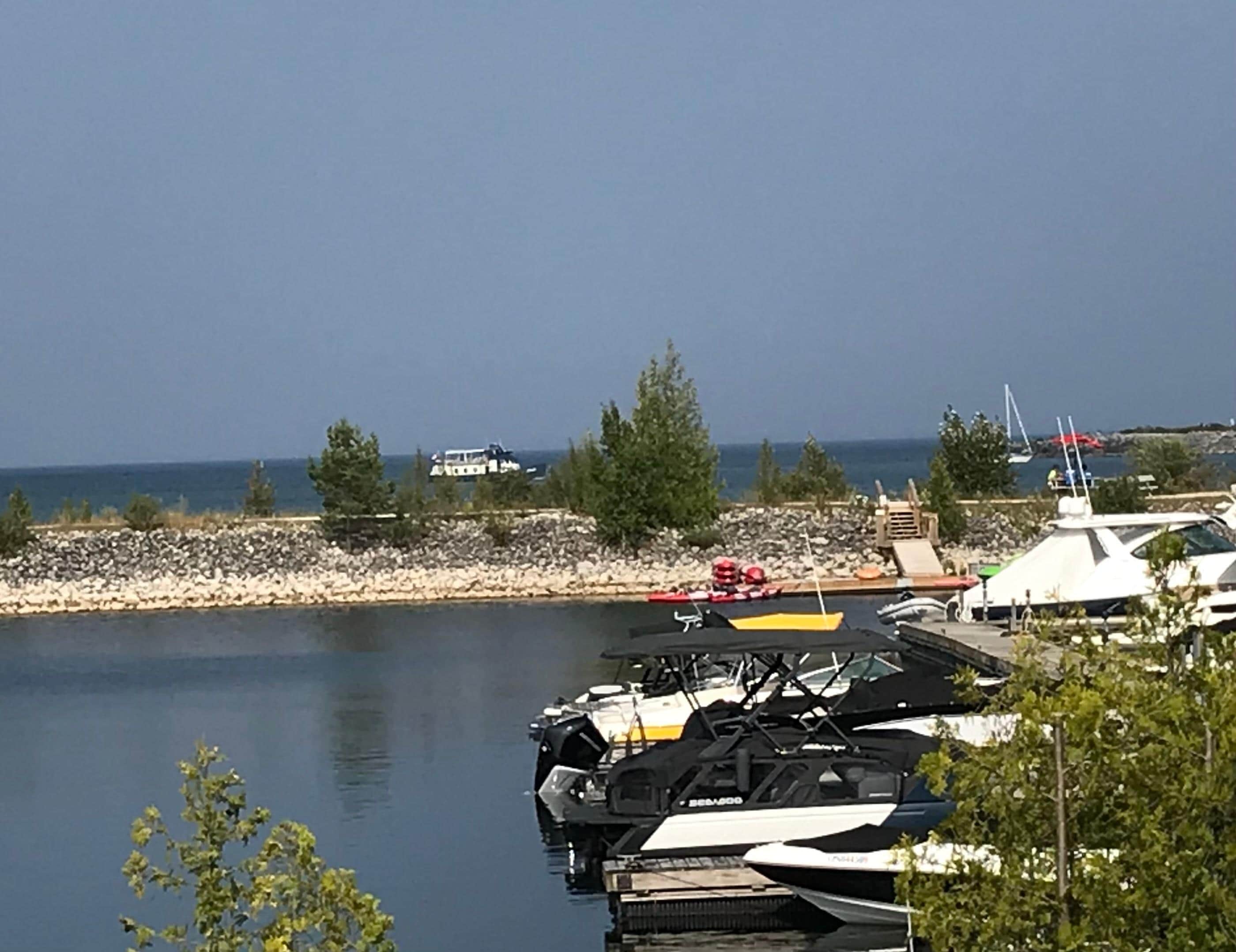 Collingwood cruise vessel beyond breakwall - daily sightseeing trips