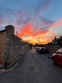 The mill (left) at sunset