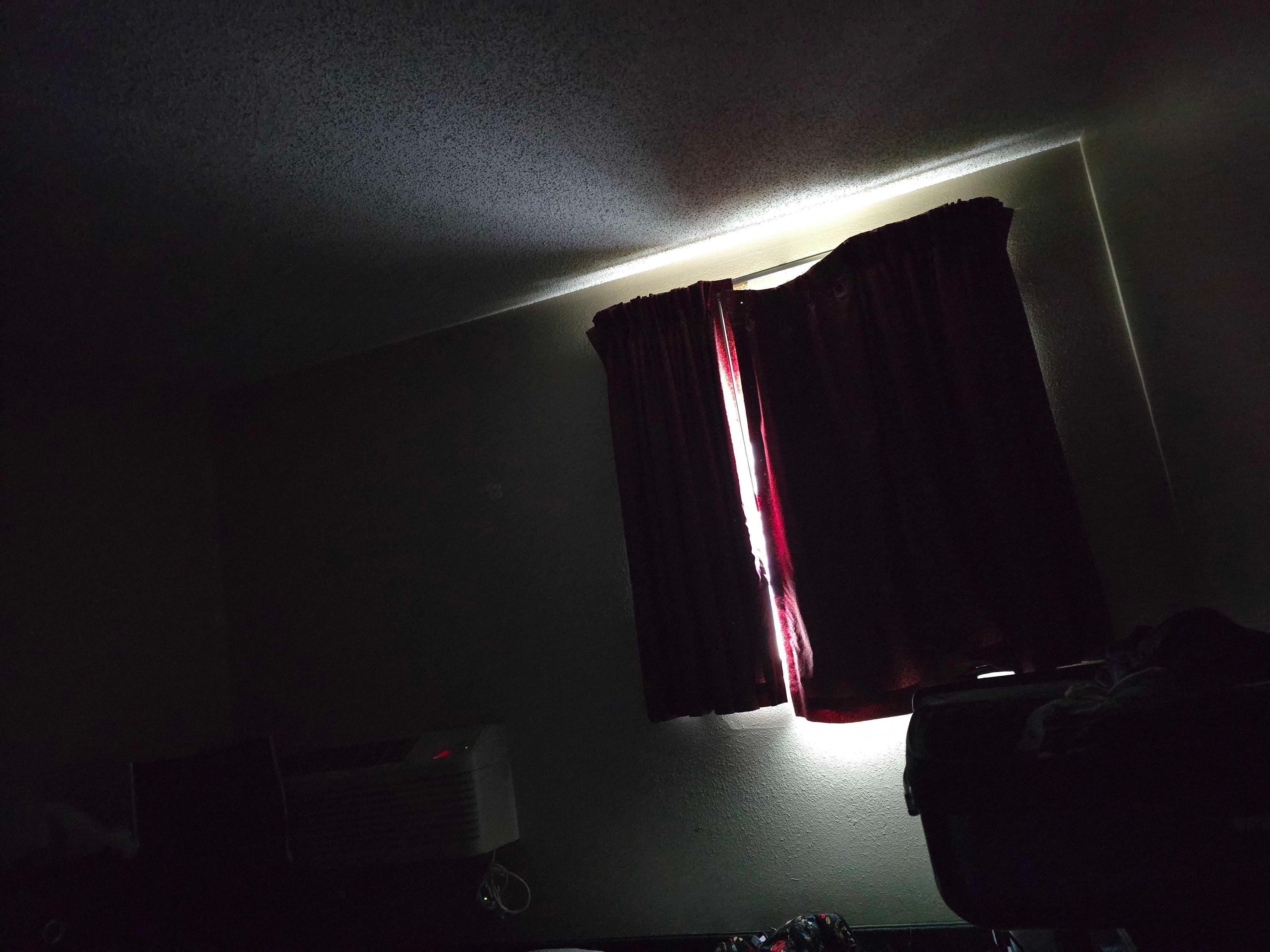 broken "blackout" curtains