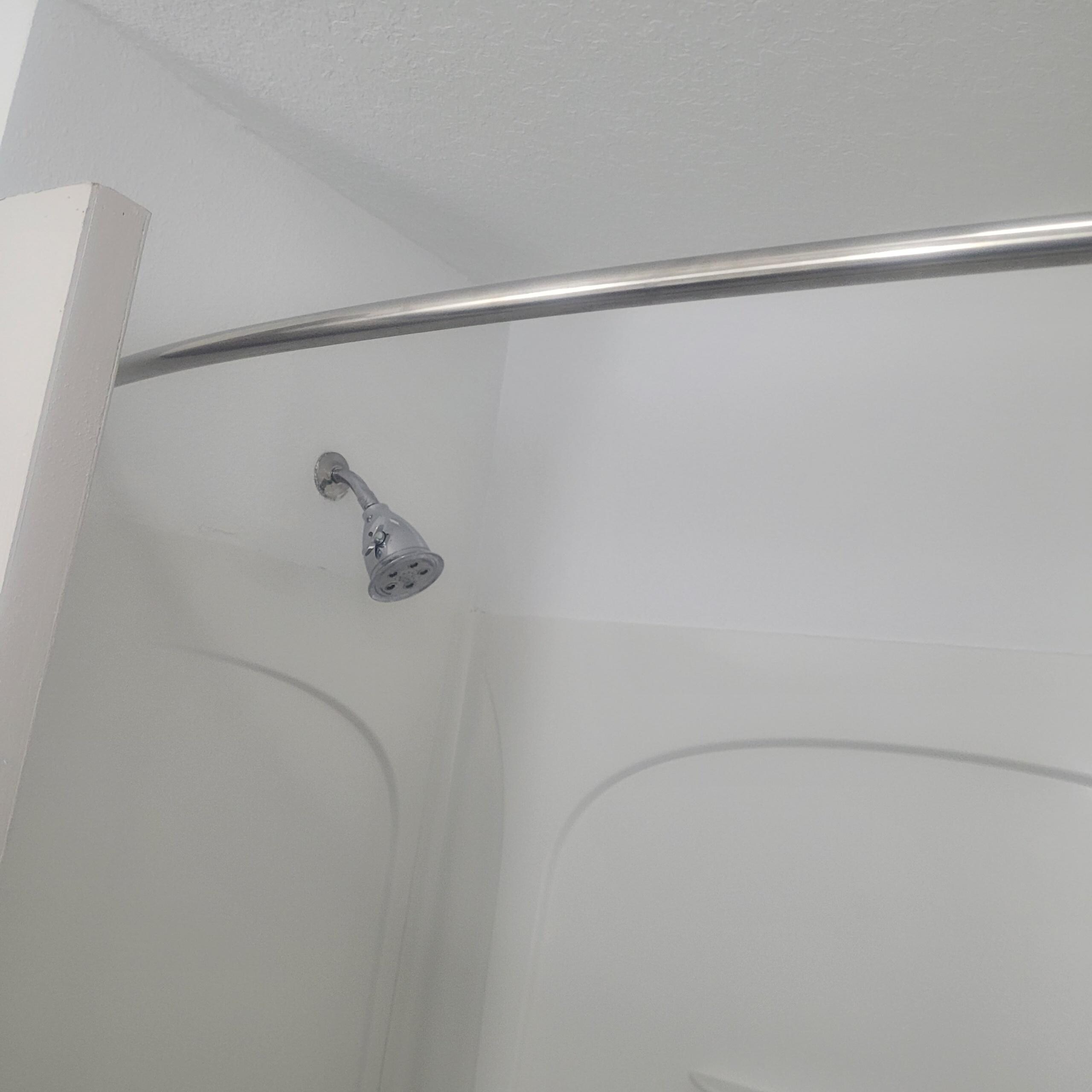 There was no shower curtain.