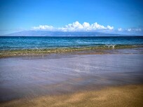 Beach is steps from the room.