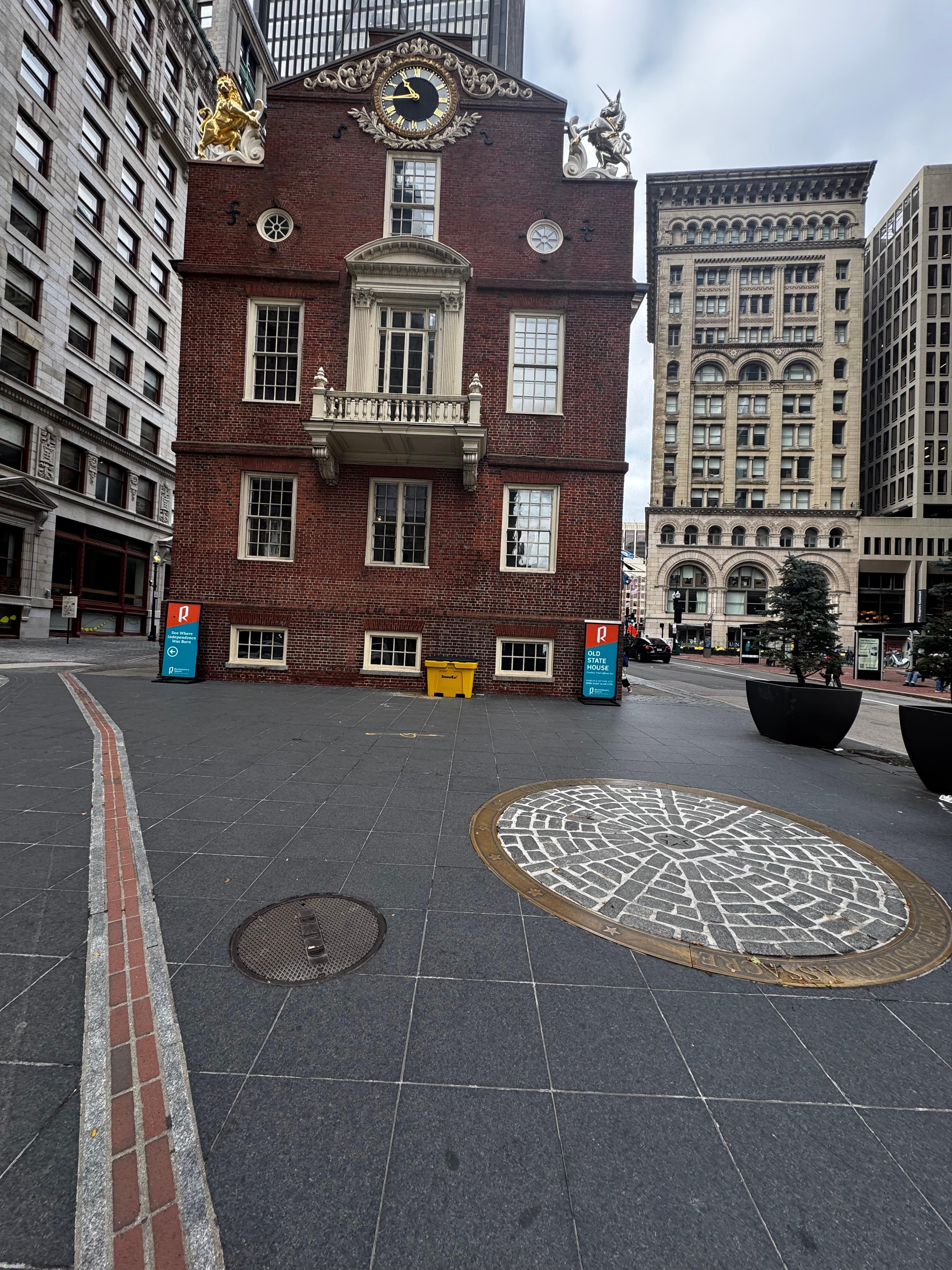 Boston Massacre location marked by an icon in the road.