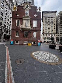 Boston Massacre location marked by an icon in the road.