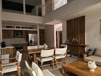 View of the dining and kitchen areas from the living room